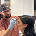 Dr. Lyman determines where to place Botox on a patient