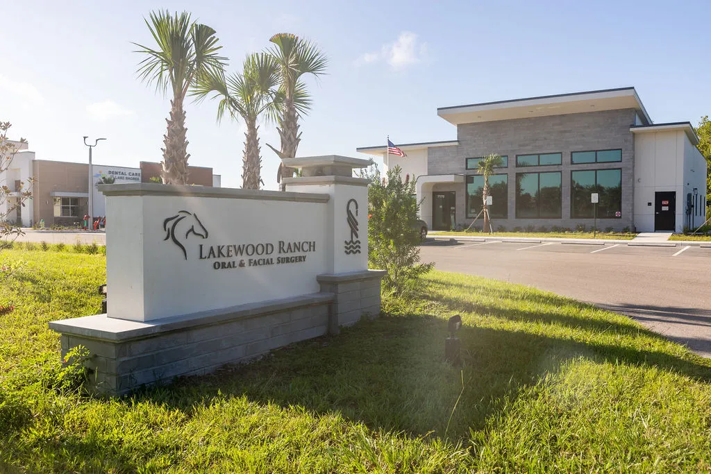 Lakewood Ranch Oral & Facial Surgery exterior sign with modern office building and palm trees